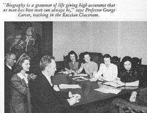 A photo of Professor George Carver teaching a class.