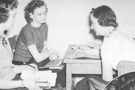 A photo of Professor Emily Gertrude Irvine teaching students. 
