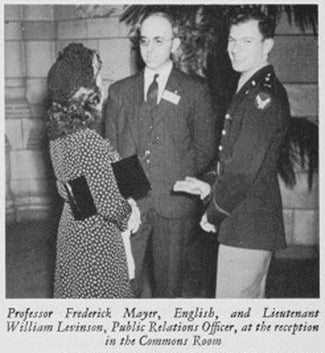 A photo of Professor Mayer and a student solider in the Commons Room.