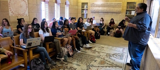 Students in a classroom lecture