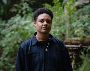 Headshot of Xan Phillips